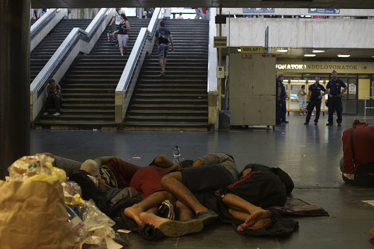 Syrian refugees having rest at the floor of Keleti railway station. Refugee crisis. Budapest, Hungary, Central Europe, 3 September 2015