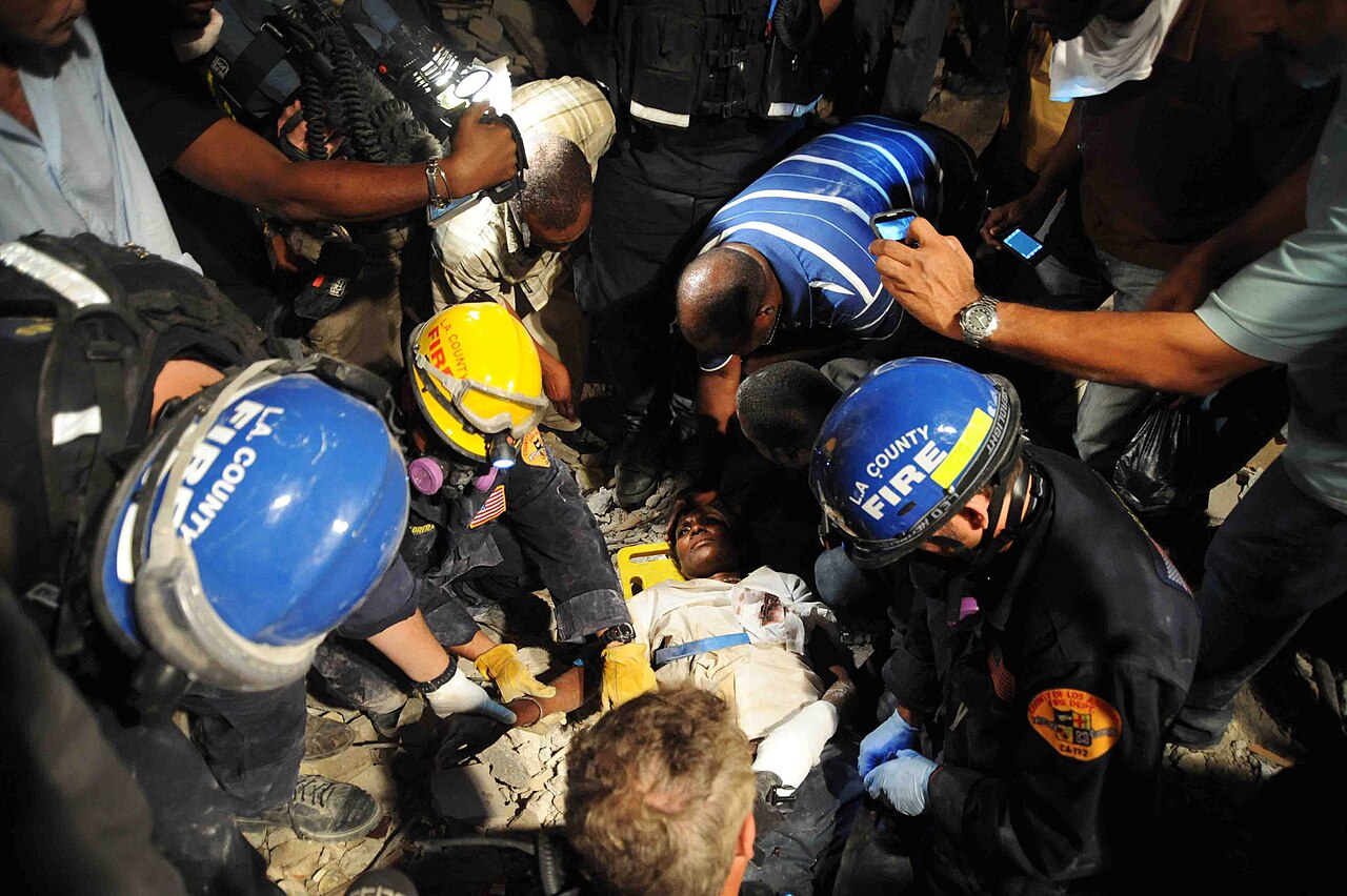 Search and Rescue Team Saves Haitian Woman Five Days After Earthquake (4289285636)