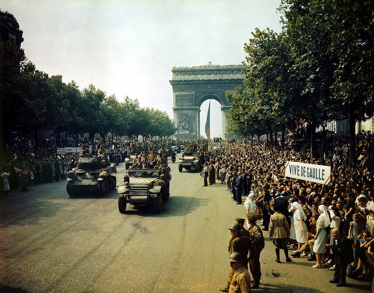 Crowds of French patriots line the Champs Elysees